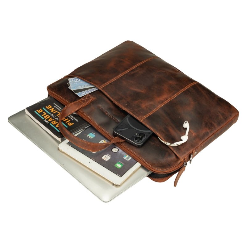 Minori Leather Atlas 14-inch unisex chestnut leather laptop sleeve with sleek design and textured finish.