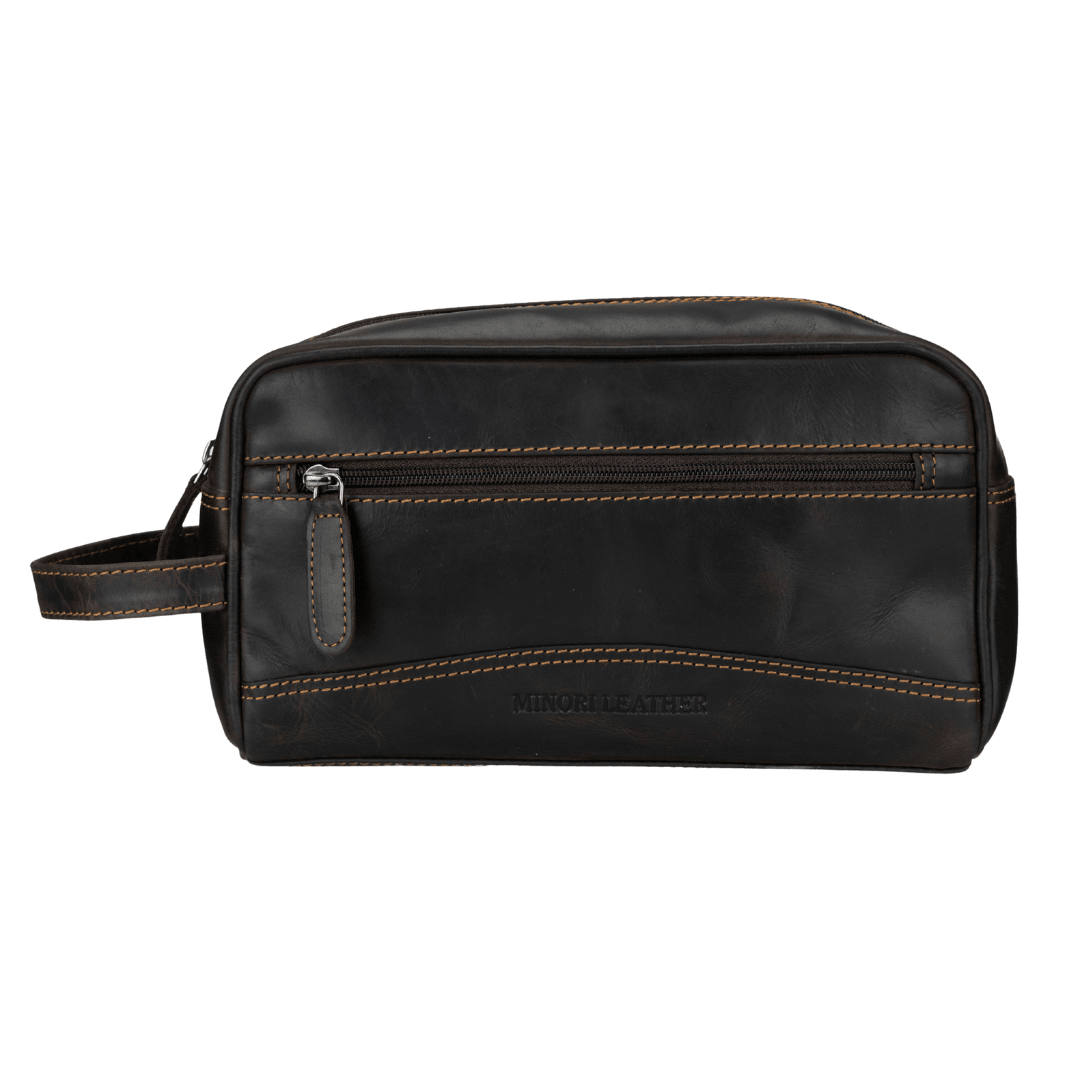 Brown premium leather toiletry bag for men by Minori Leather, featuring a sleek design and sturdy zipper.