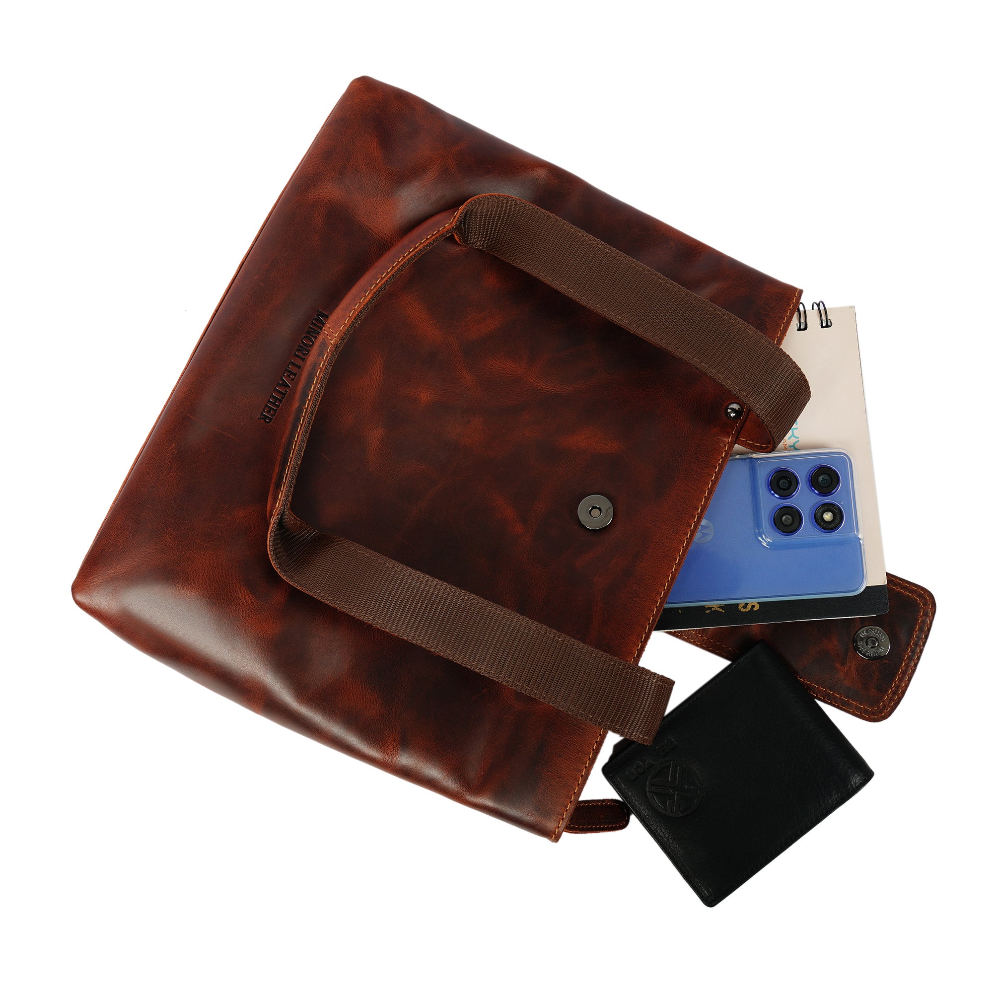 Minori Leather Bennett leather shoulder tote bag in chestnut color with sturdy handles and spacious interior.
