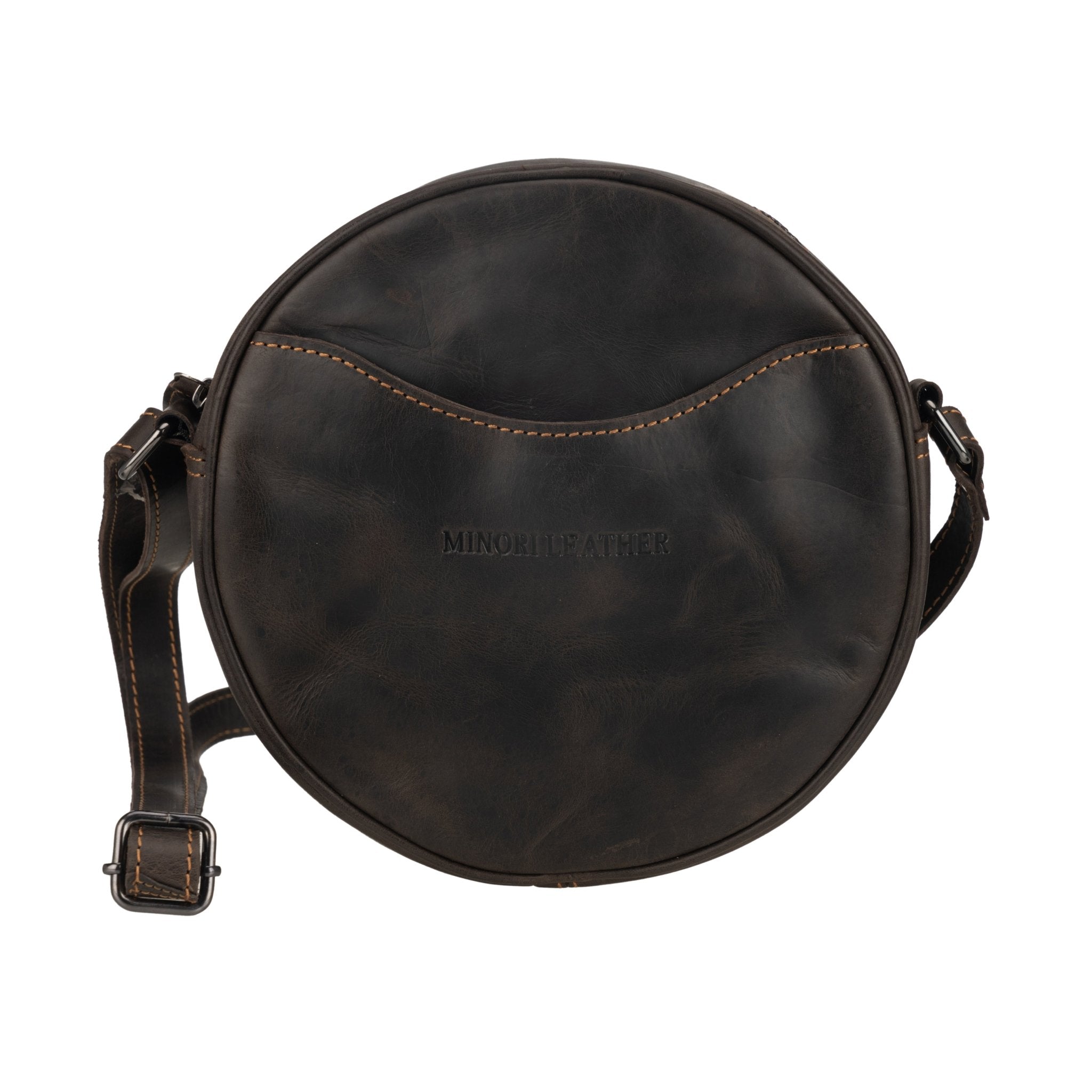 Minori Leather Luna leather crossbody bag in chestnut and hair-on brown with round shape and adjustable strap, stylish women's accessory.