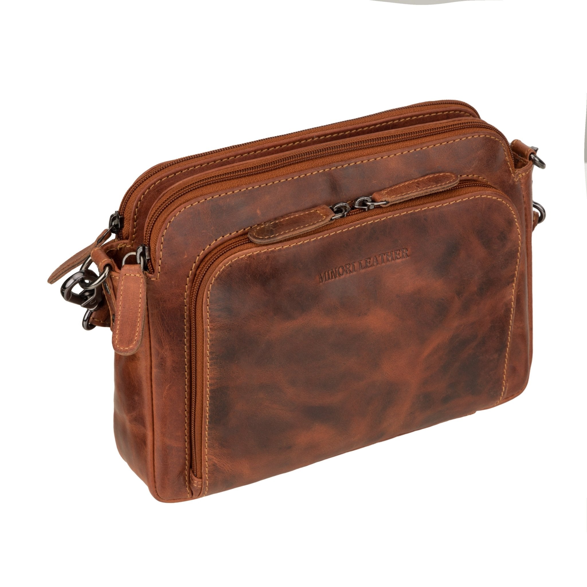 Minori Leather Ellis leather crossbody bag in chestnut with adjustable strap and sleek design, perfect for everyday use.