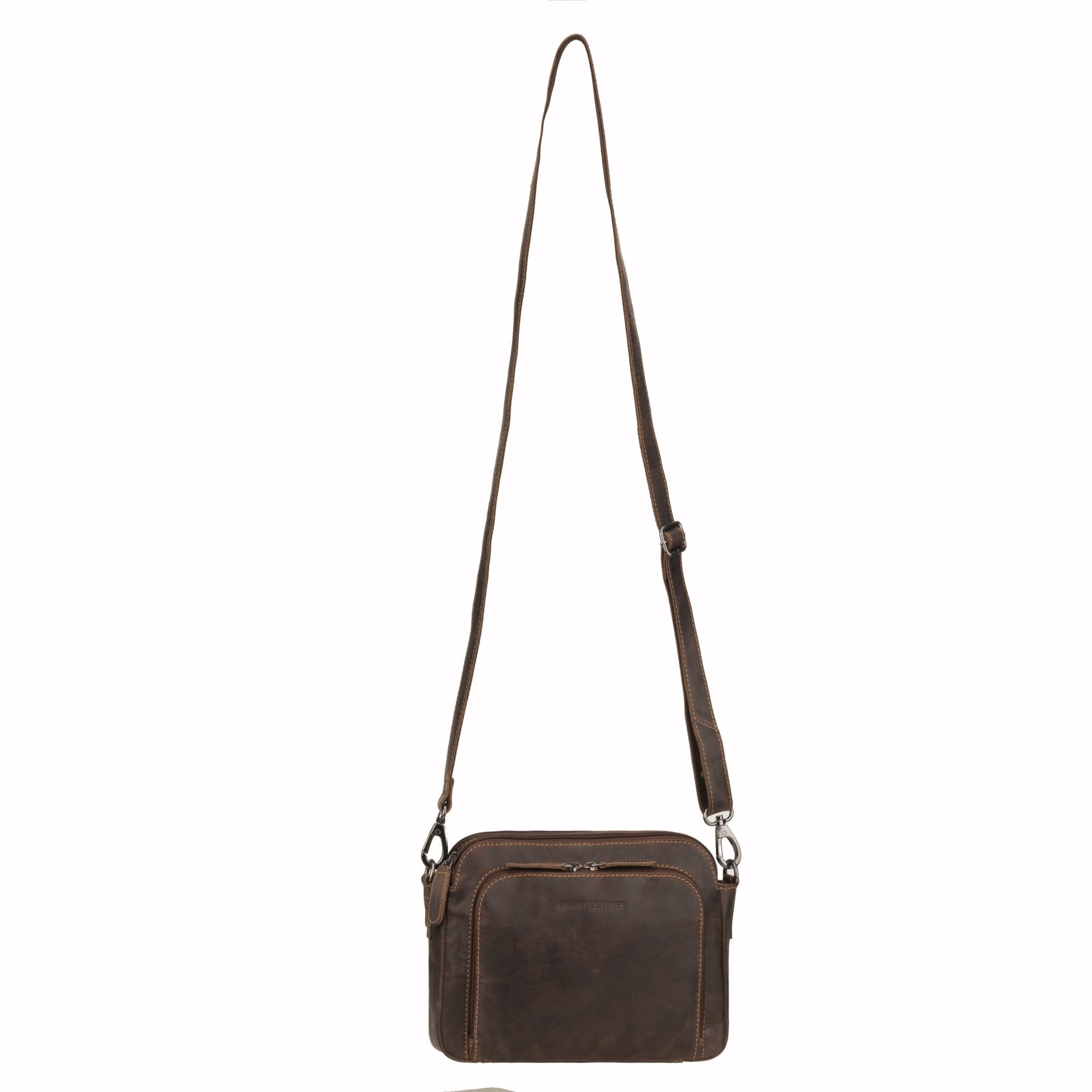 Minori Leather Ellis brown leather crossbody bag showing adjustable strap and sleek design.