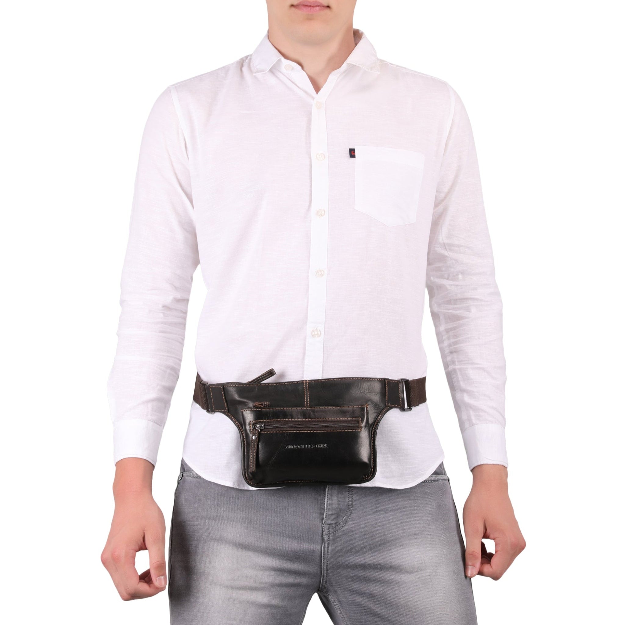Male model carrying a brown Minori leather fanny pack on his waist by Minori Leather featuring multiple compartments and an adjustable strap with buckle closure