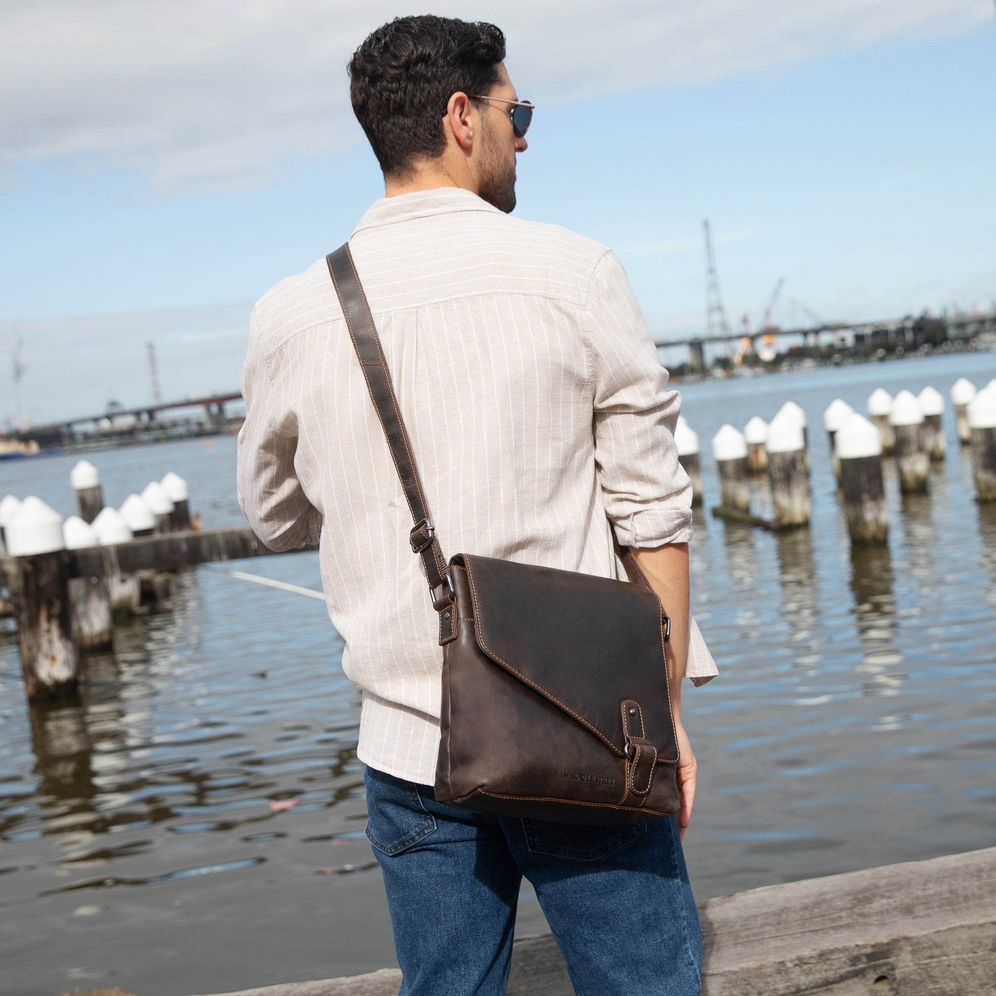 Minori Leather Noah brown leather crossbody satchel bag with adjustable strap and classic design.