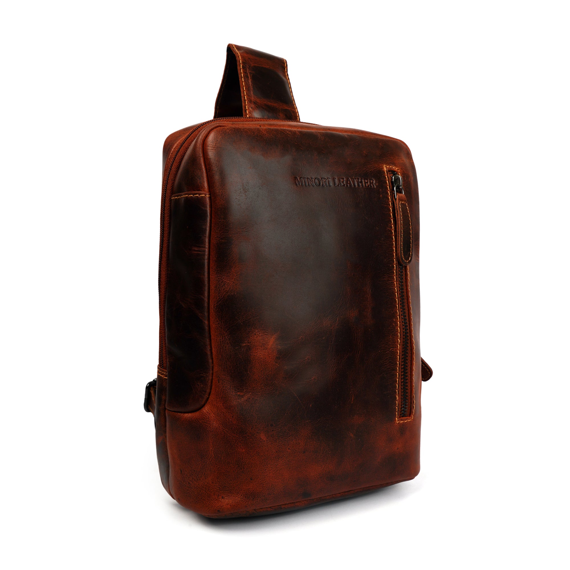 Minori Leather Luxe Leather Sling Crossbody Bag in Chestnut with adjustable strap and sleek design.