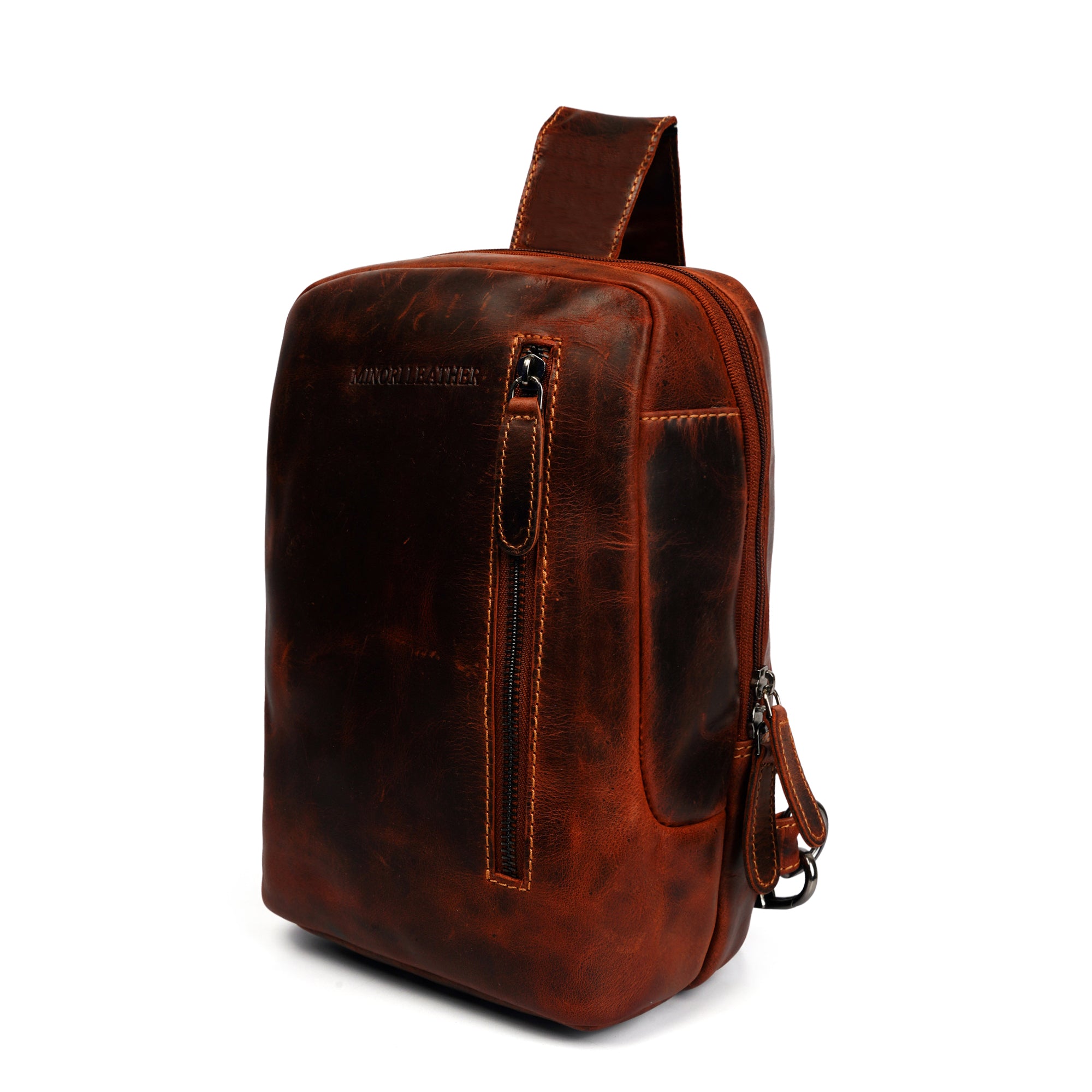 Minori Leather Luxe Leather Sling Crossbody Bag in Chestnut with adjustable strap and sleek design.