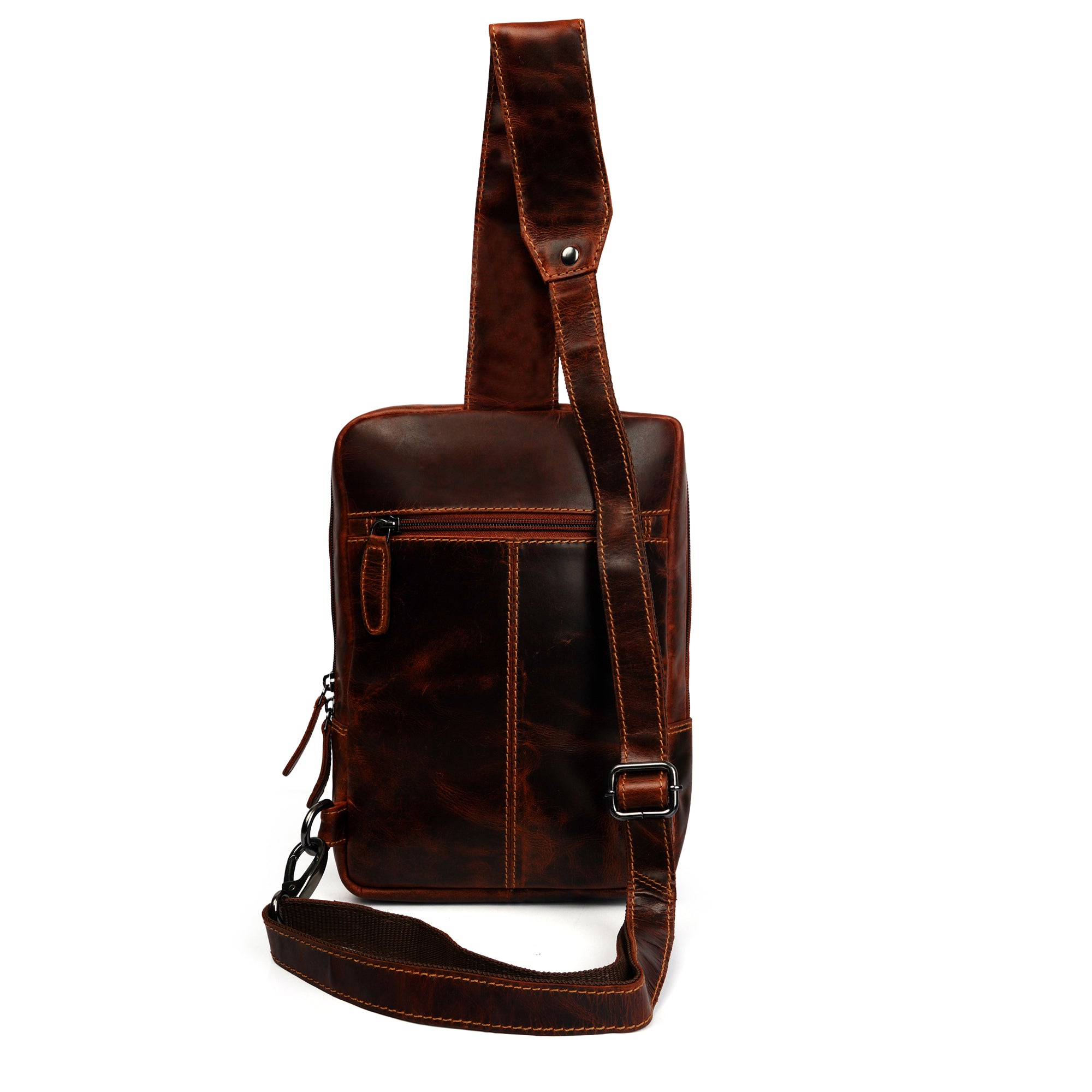 Minori Leather Luxe Leather Sling Crossbody Bag in chestnut with adjustable strap and sleek design, close-up view of the bag's leather texture.