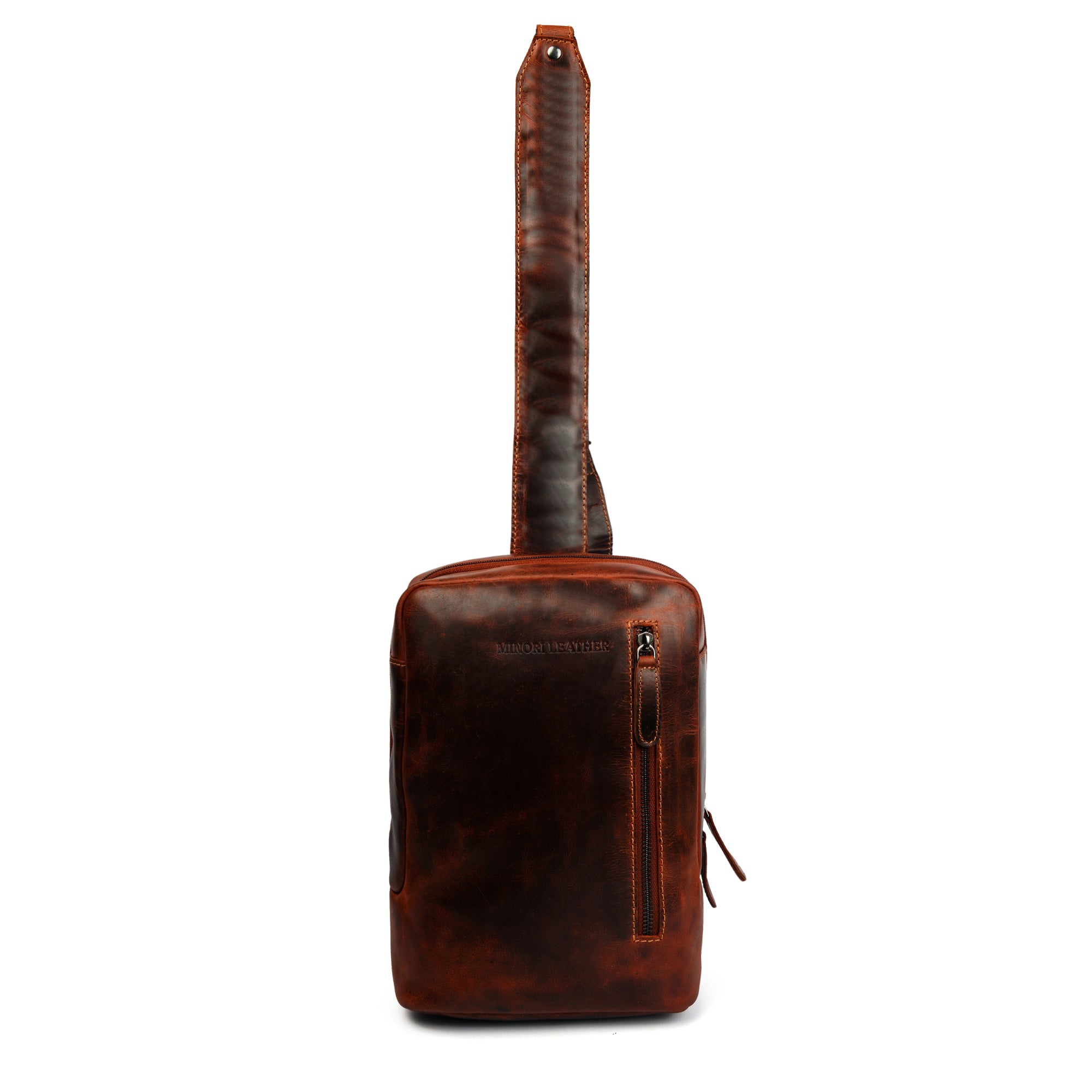 Minori Leather Luxe Leather Sling Crossbody Bag in Chestnut with adjustable strap and sleek design.
